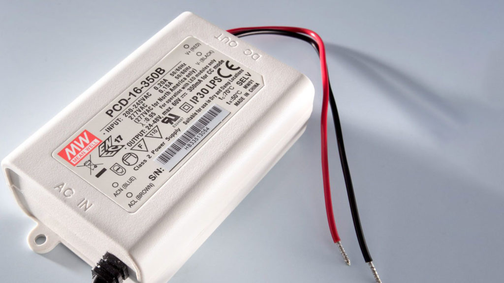 The workshop showcased high-quality LED drivers in a well-lit space with aerial photography. High Quality Meanwell LED Driver On Gray Background