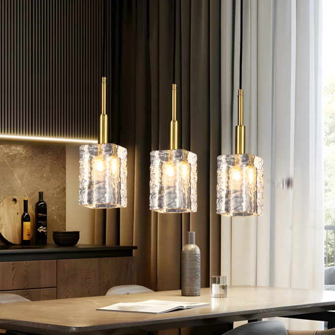 Elegant glass pendant lights over modern dining table, interior design.