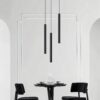 5 (Custom) Minimalist dining room with modern pendant lights and black table set.