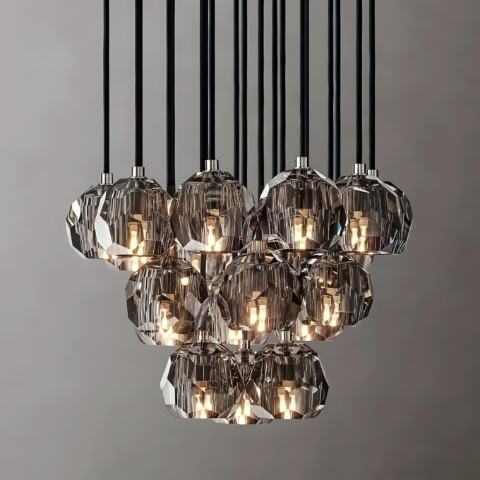 small (6) Modern multi-light crystal chandelier with geometric design and decorative warm lighting, hanging against a neutral background.