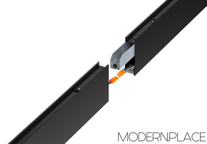 Luma_Linear_Office_Pendant_Light (5)_small Close-up of black linear LED light connectors with wiring exposed, showcasing product details.